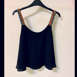 Black fluttery swing tank with bright woven straps